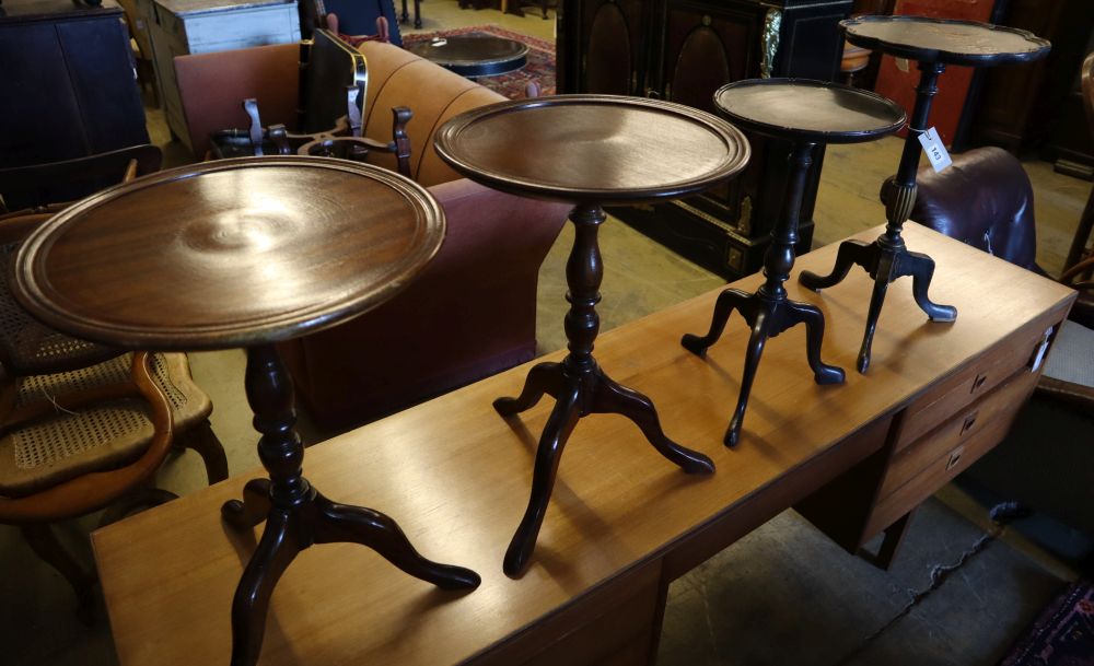 A 1920s chinoiserie lacquer tripod table, height 54cm and three others